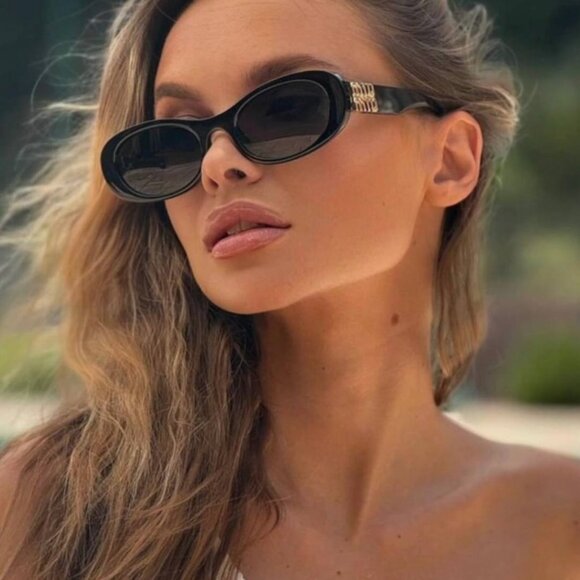 Miu Miu MU06ZS 1AB5S0 Oval Sunglasses - Black / Grey main image 11
